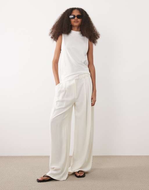 ASOS DESIGN – Vit, skir, ärmlös topp med hög krage i slubbväv, 2 av 4