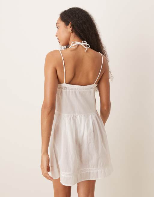 ASOS DESIGN – Vit, skir, broderad strandklänning i minilängd med låg midja, 3 av 4