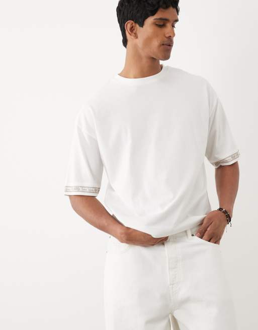 ASOS DESIGN – Vit t-shirt i oversize med boxig passform, texttryck och ärmtryck, 2 av 5