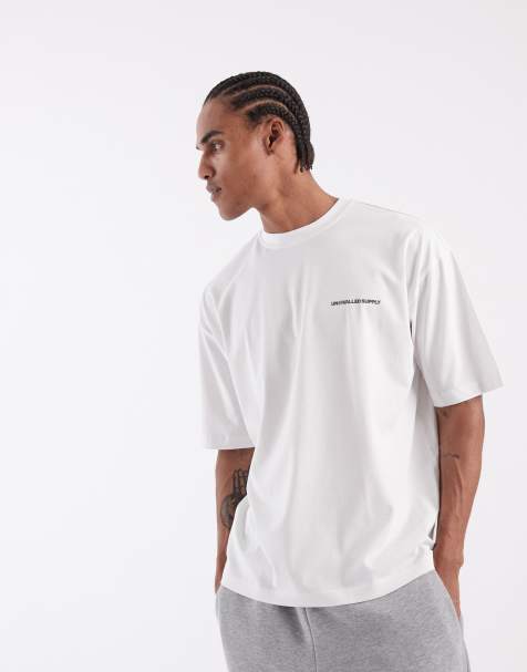 ASOS DESIGN – Vit t-shirt i oversized fit med 'Unrvlld'-texttryck - view 1