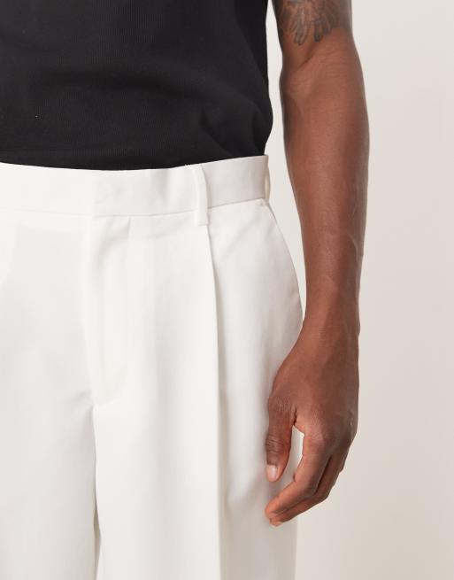 ASOS DESIGN – Vita, avsmalnande finbyxor i oversize med veck framtill, 3 av 5
