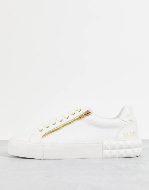 ASOS DESIGN – Vita sneakers i läderimitation med diamantformad sula och guldfärgade dragkedjor