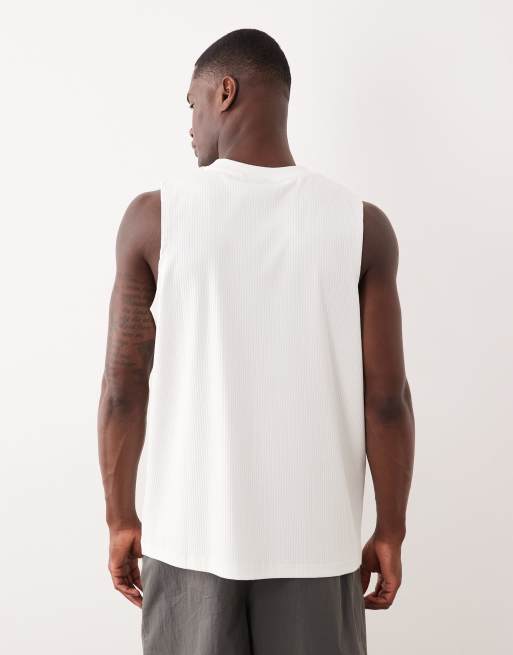 ASOS DESIGN – Vitt, superkraftigt, ribbat sportlinne med avslappnad passform och blomtryck, 3 av 7