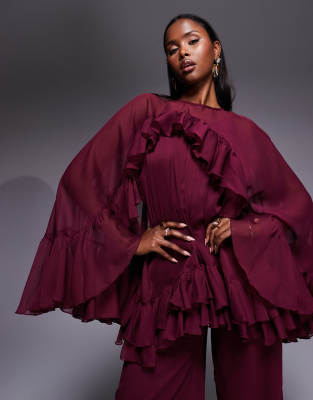 Asos Design Volume Ruffle Cape Jumpsuit In Burgundy