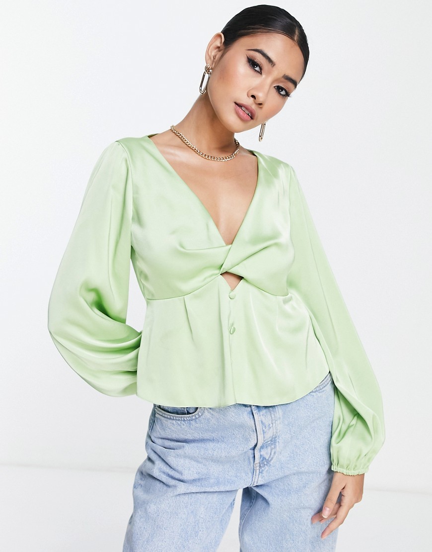 ASOS DESIGN volume sleeve top with twist front detail and cut out in apple-Green