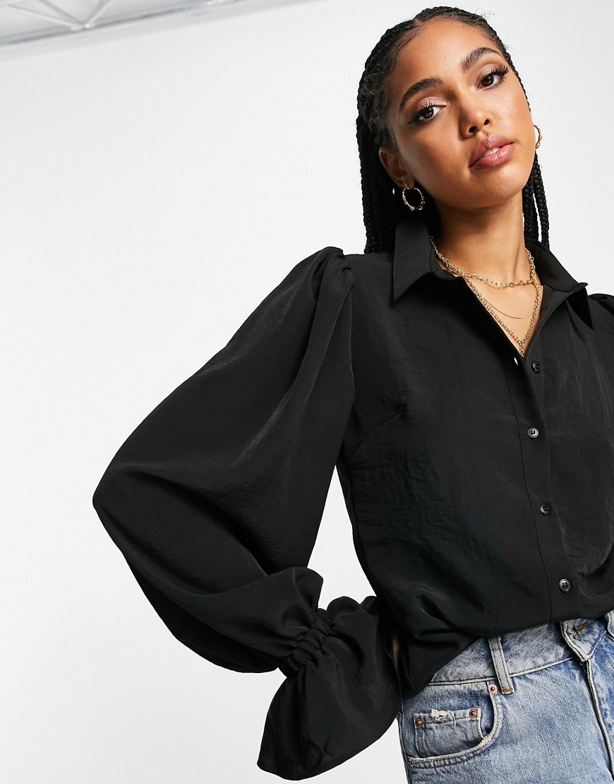 ASOS DESIGN volume sleeved soft shirt with ruffle cuffs in black