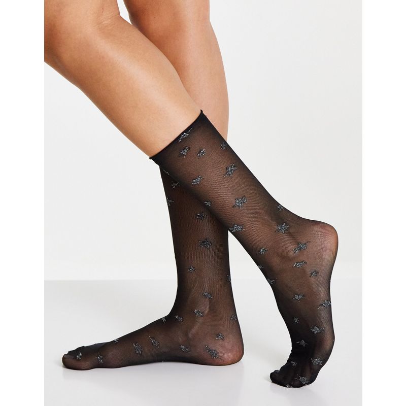 DESIGN – Wadenhohe, transparente Socken in Schwarz mit glitzerndem Sternenmuster