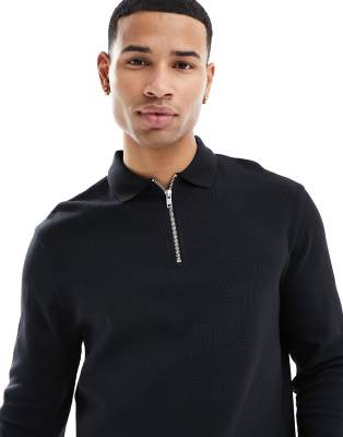 ASOS DESIGN waffle long sleeve polo with zip in black