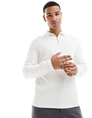 ASOS DESIGN waffle long sleeve polo with zip in ecru-White