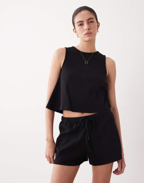 ASOS DESIGN waffle texture relaxed draw string shorts in black - part of a set - view 1