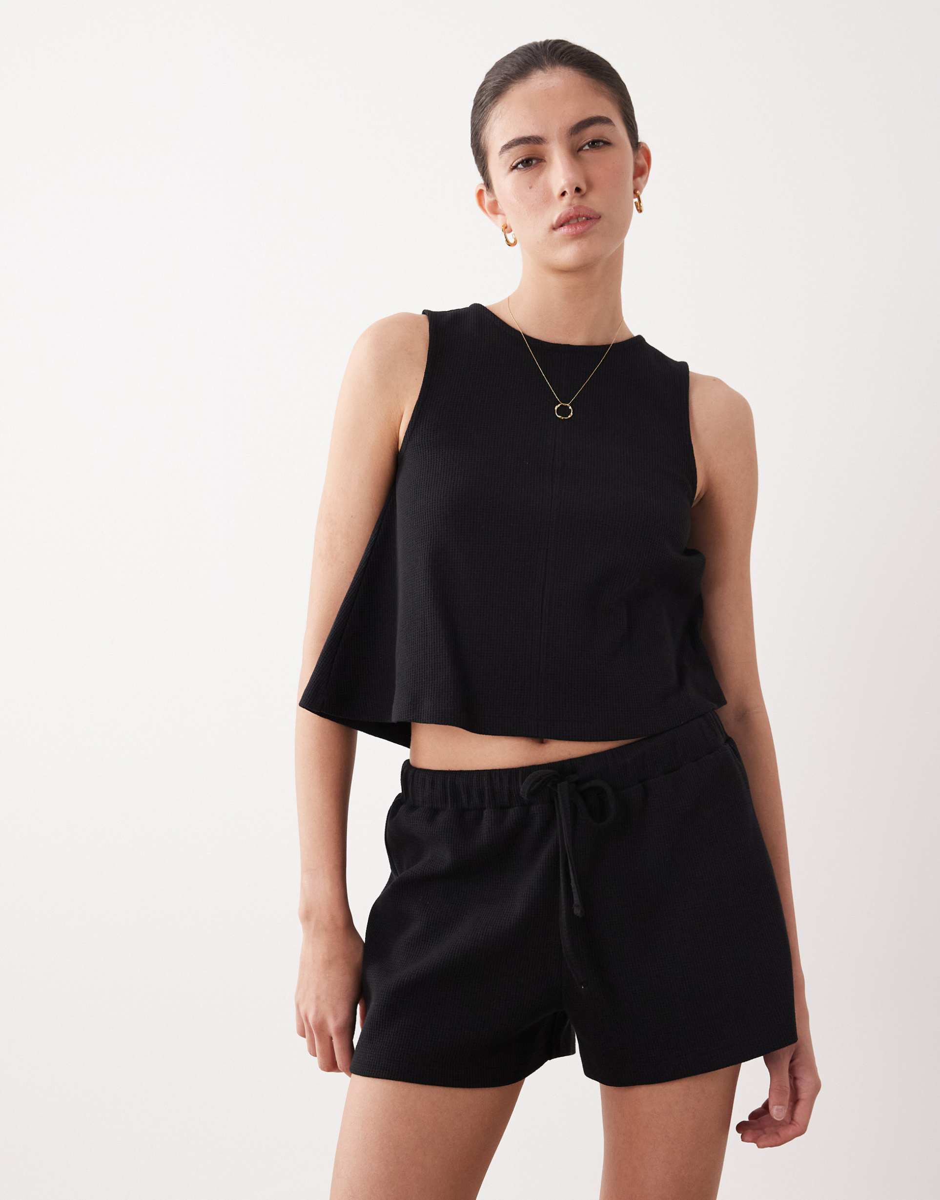 asos design waffle texture relaxed draw string shorts in black - part of a set