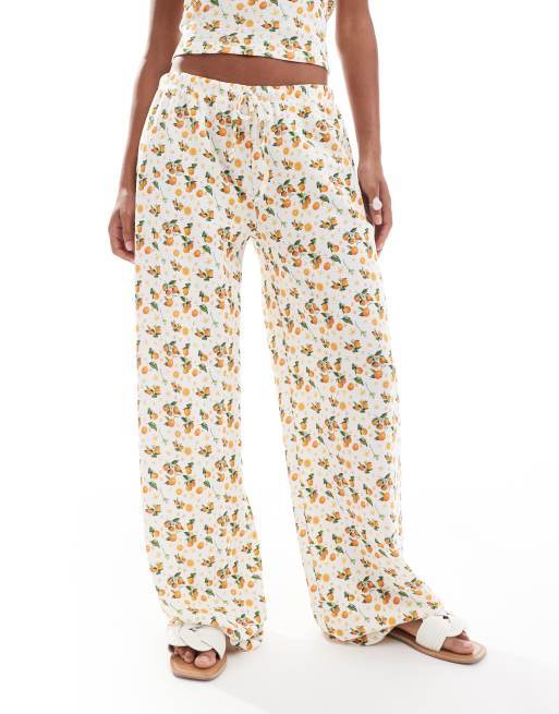 ASOS DESIGN waffle  wide leg trouser co-ord in orange fruit print , 3 of 5