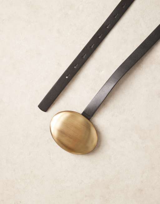 ASOS DESIGN waist and hip belt in black with brushed gold-tone disc buckle