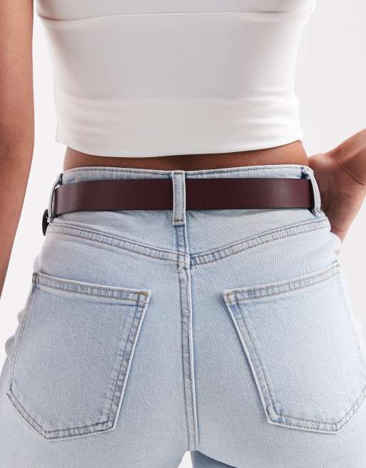 ASOS DESIGN waist and hip jeans belt with gold buckle in burgundy