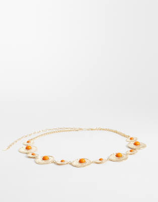 waist and hip orange stone set chain belt in gold