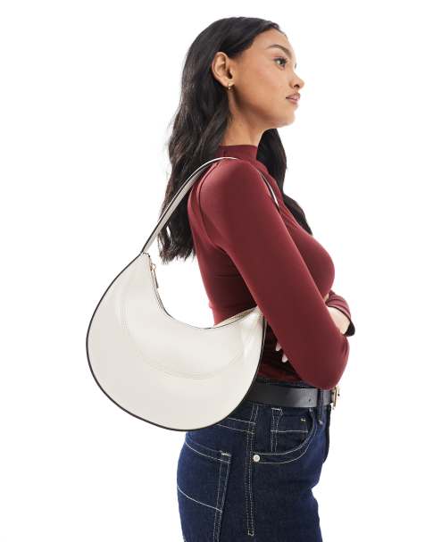 ASOS DESIGN – Wandelbare Schulter- und Clutch-Cookie-Tasche in Weiß mit geschwungenem-Design - view 1