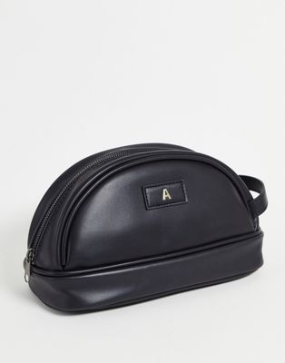 ASOS DESIGN washbag in faux leather with A initial in black