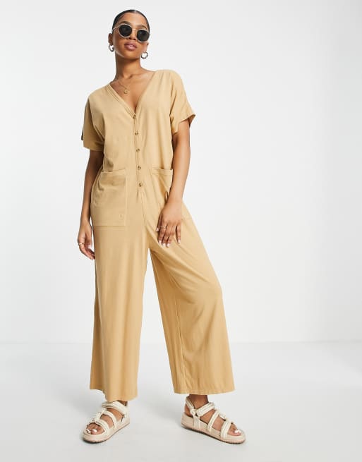 ASOS DESIGN washed button through oversized jumpsuit in stone