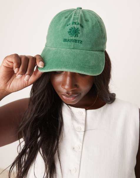 ASOS DESIGN washed cap in green with slogan - view 1