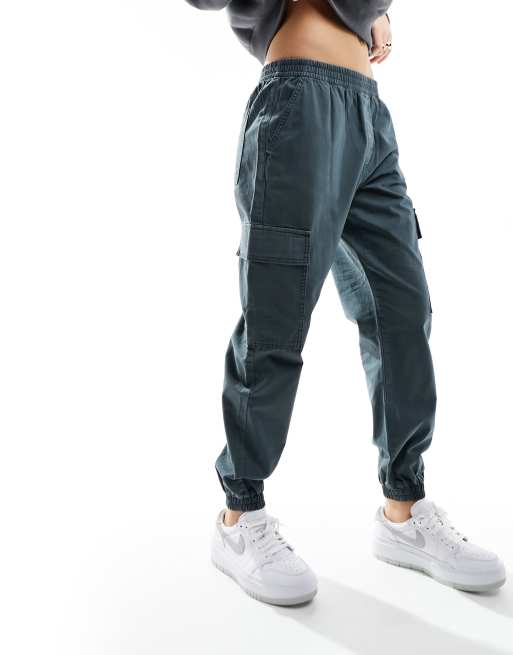 ASOS DESIGN washed cargo pants with cuff hem in petrol blue