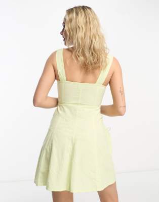 ASOS DESIGN washed cotton utility mini dress with button detail in light  green