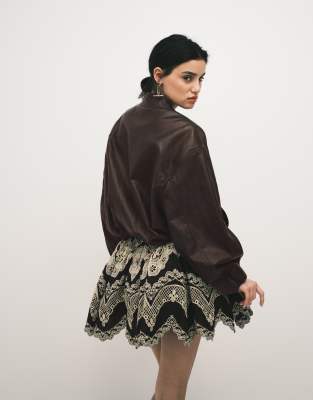 Asos Design Washed Leather Look Oversized Bomber Jacket In Black