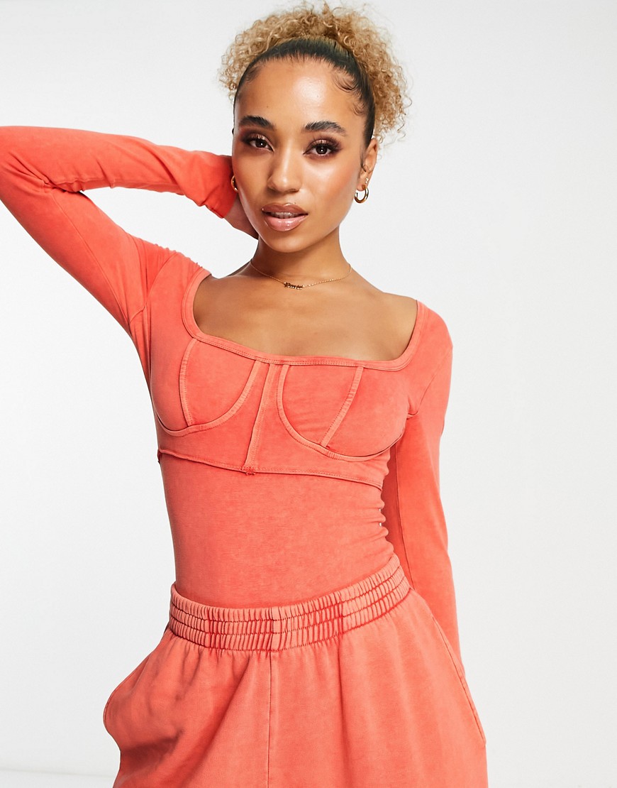 ASOS DESIGN washed long sleeve seamed bodysuit in red