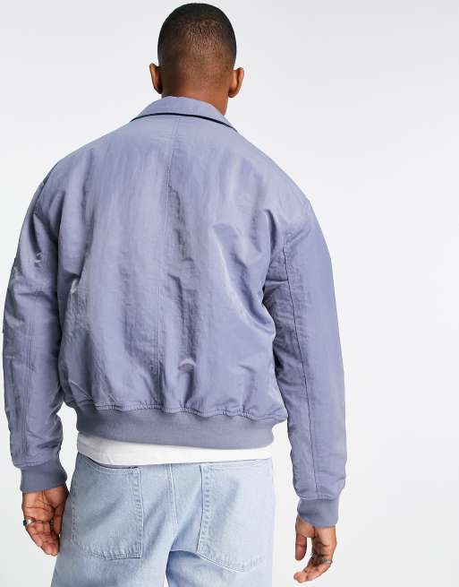 ASOS DESIGN washed oversized bomber jacket with MA1 pocket in blue