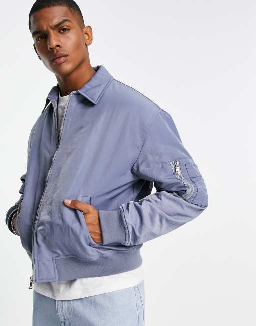 ASOS DESIGN washed oversized bomber jacket with MA1 pocket in blue