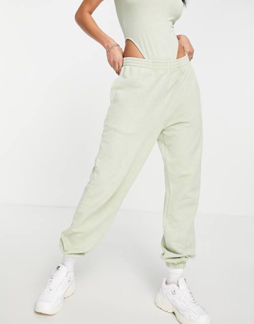 ASOS DESIGN washed oversized trackies in lime
