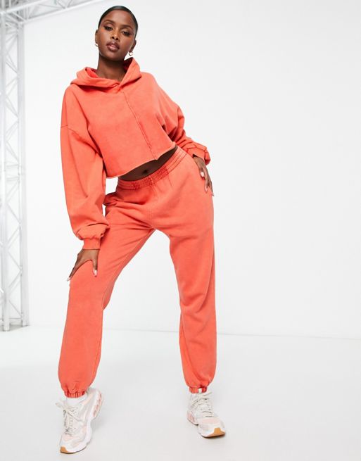 ASOS DESIGN washed oversized trackies in red