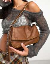 Fashion Brown Shoulder Bag Hang On Stock Photo 217074025