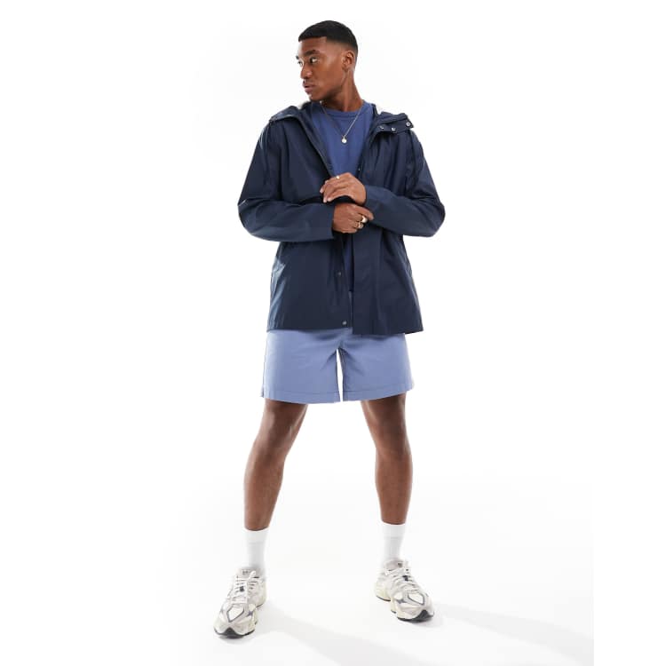 ASOS DESIGN – Wasserabweisende, gummierte Regenjacke in Marineblau