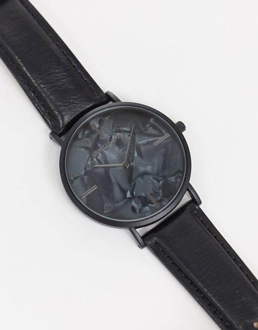 ASOS DESIGN watch in black with mixed mottle effect dial