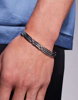 watch strap bracelet with embossed detail in silver tone