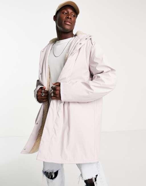 ASOS DESIGN water resistant rubberized rain jacket in pink with