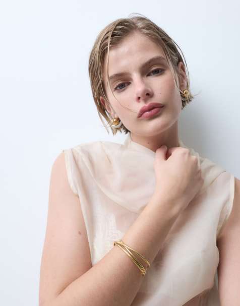 ASOS DESIGN waterbestendige roestvrijstalen cuffarmband met overslagdesign in goudkleur - GOLD - view 1