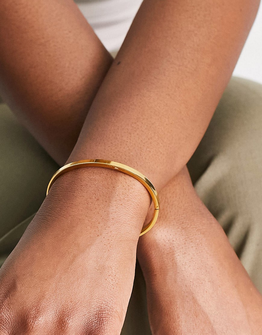 ASOS DESIGN waterproof stainless steel bangle in gold tone
