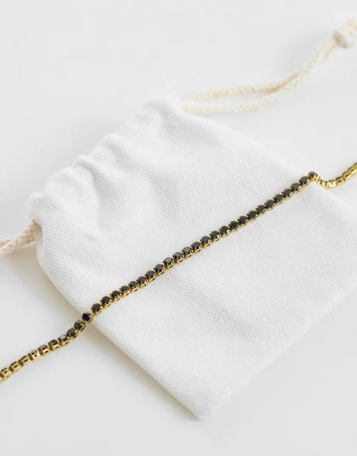 ASOS DESIGN waterproof stainless steel black cubic zirconia stone cup chain bracelet in gold, 2 of 3