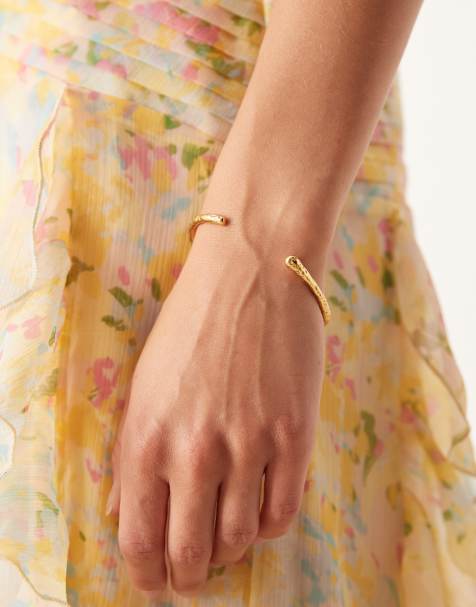 ASOS DESIGN waterproof stainless steel cuff bangle with molten design in gold tone - view 1