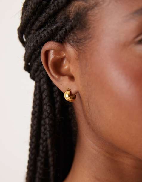 ASOS DESIGN waterproof stainless steel mini huggie hoops in gold tone - view 1