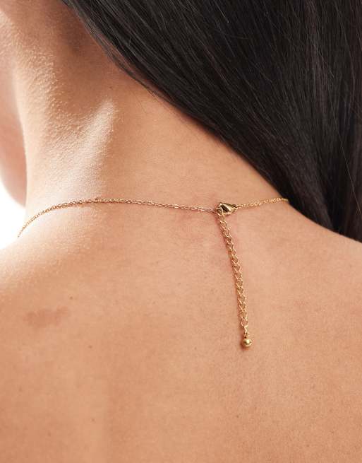 ASOS DESIGN waterproof stainless steel necklace with enamel heart design in gold tone ASOS