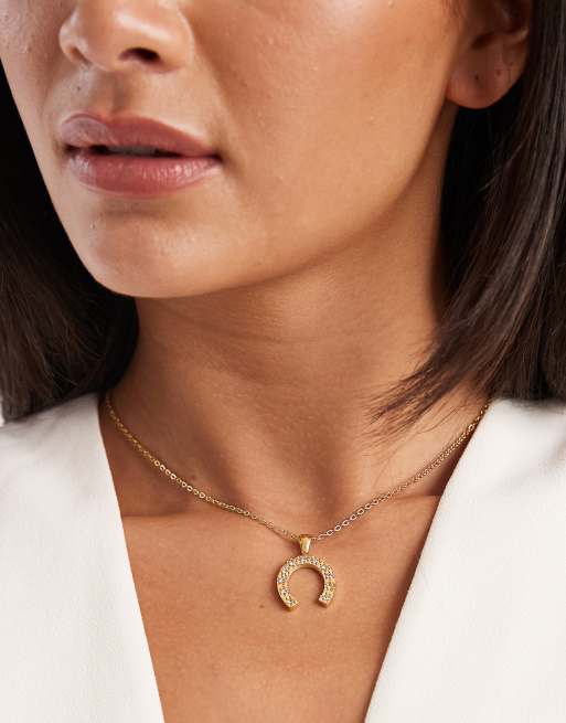 ASOS DESIGN waterproof stainless steel necklace with horse shoe charm and cubic zirconia crystals in gold tone with gift bag