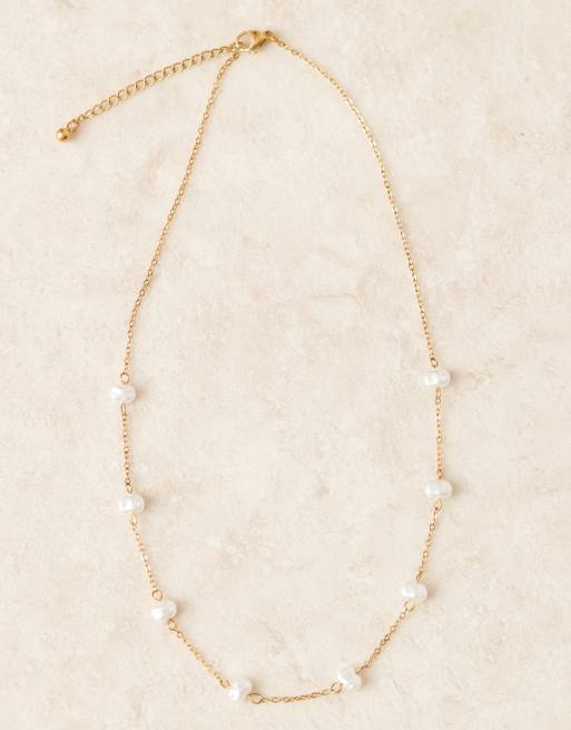ASOS DESIGN waterproof stainless steel necklace with pearl dot-dash chain in gold tone, 2 of 3