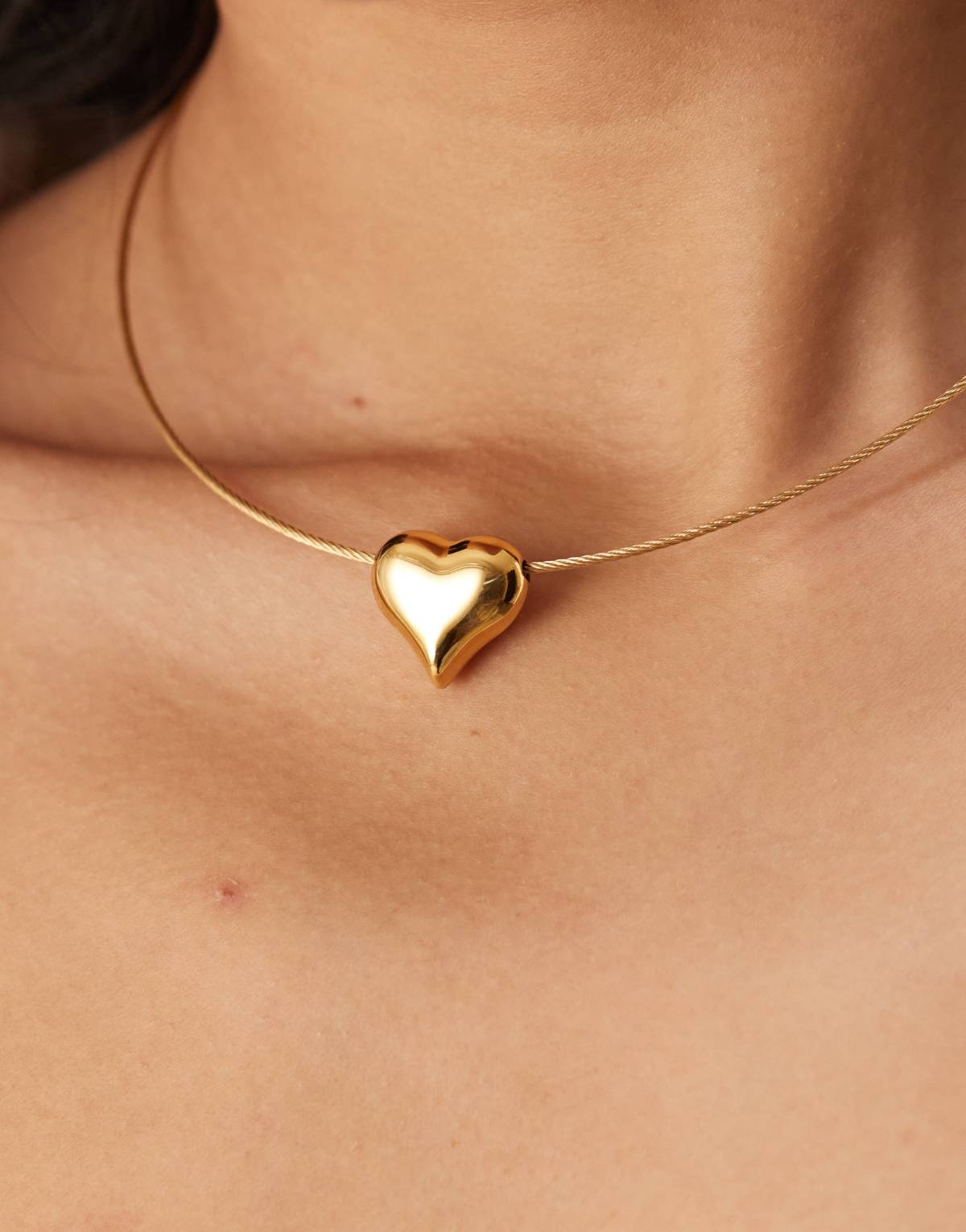 ASOS DESIGN waterproof stainless steel necklace with wire and puff heart pendant design in gold tone