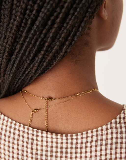 ASOS DESIGN waterproof stainless steel pack of 2 necklaces with sealife details in gold tone