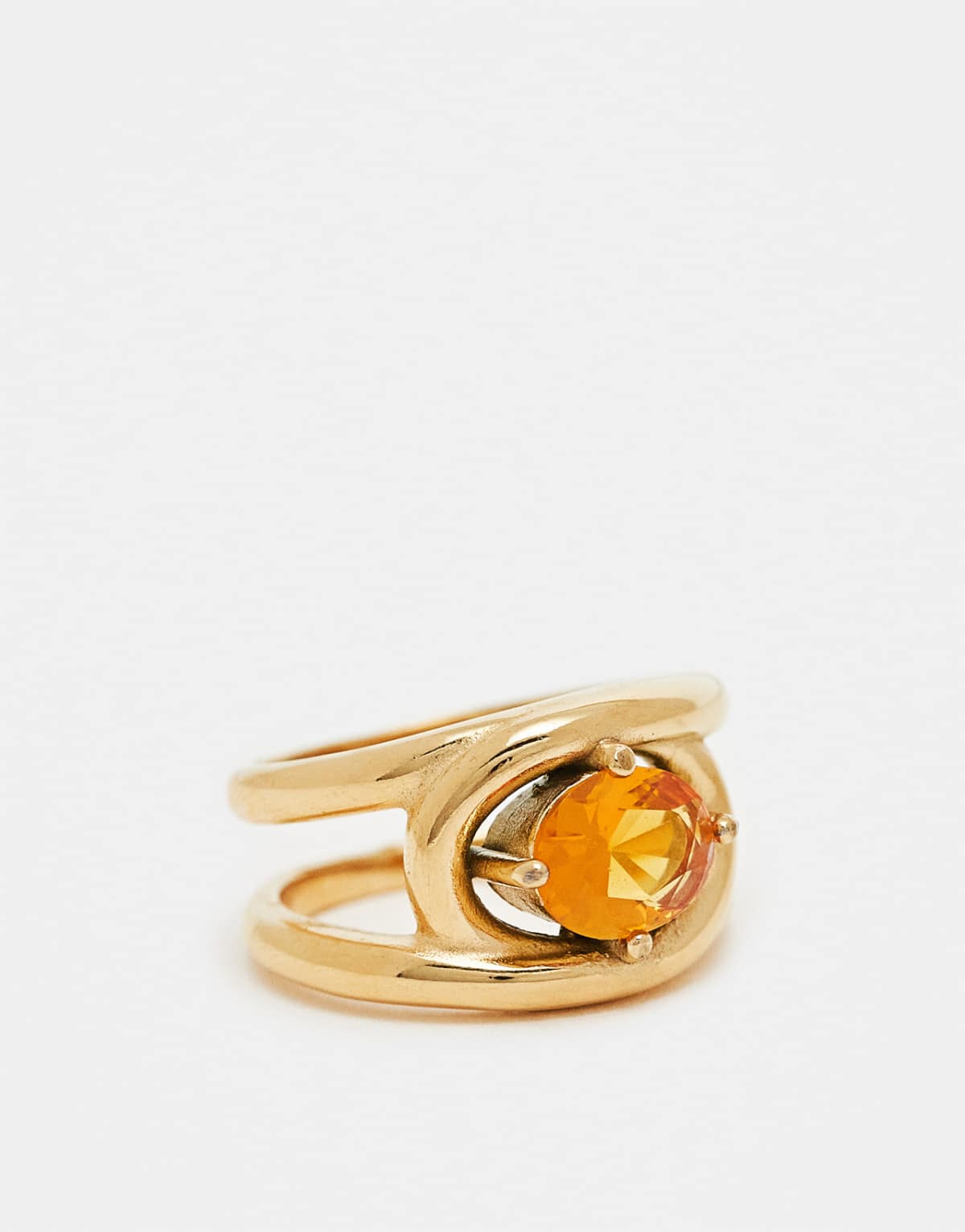 ASOS DESIGN waterproof stainless steel ring with amber crystal in gold tone