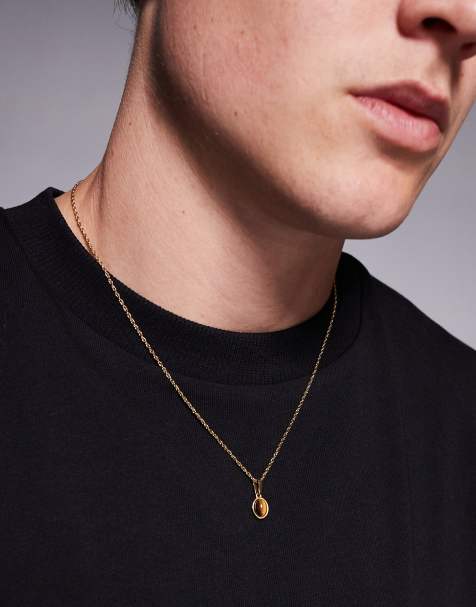 ASOS DESIGN waterproof stainless steel rope chain necklace with semi-precious tigers eye oval pendant in gold tone - view 1