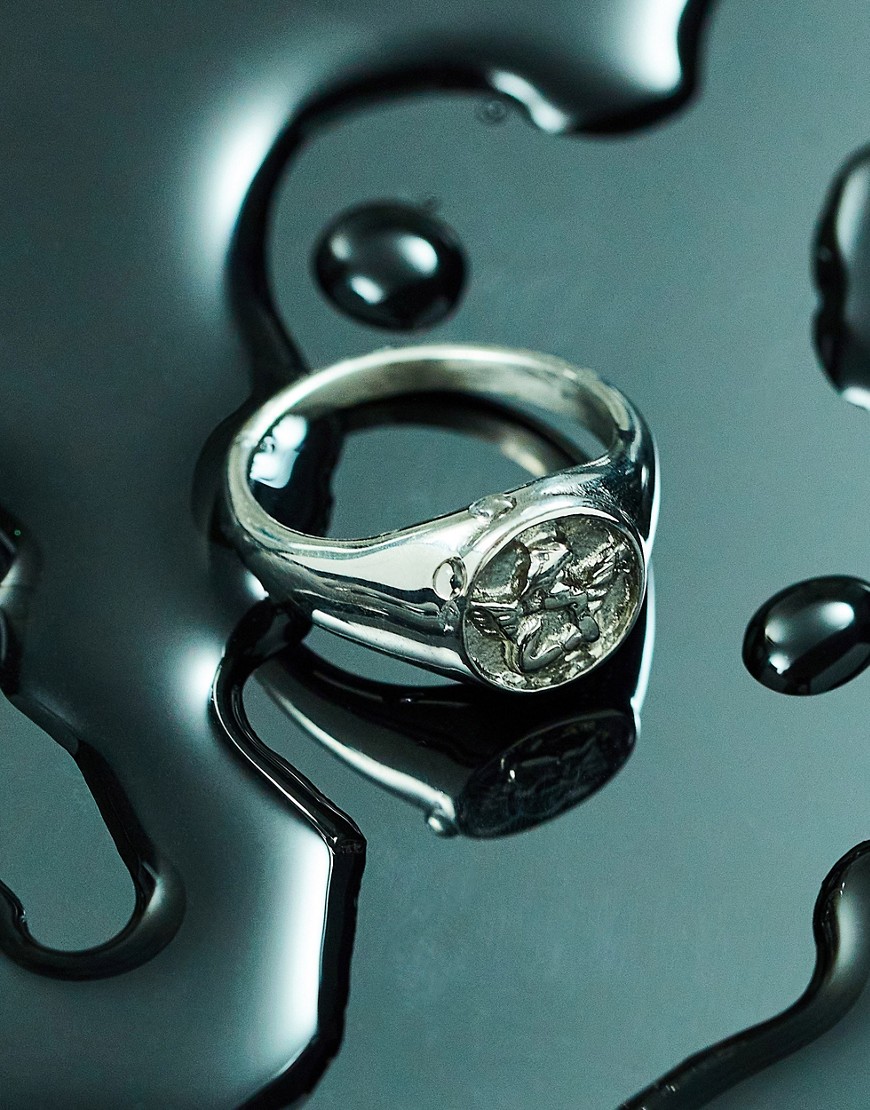 ASOS DESIGN waterproof stainless steel signet ring with cherub detail in silver tone