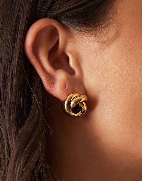 ASOS DESIGN waterproof stainless steel stud earrings with knot detail in gold tone - view 1